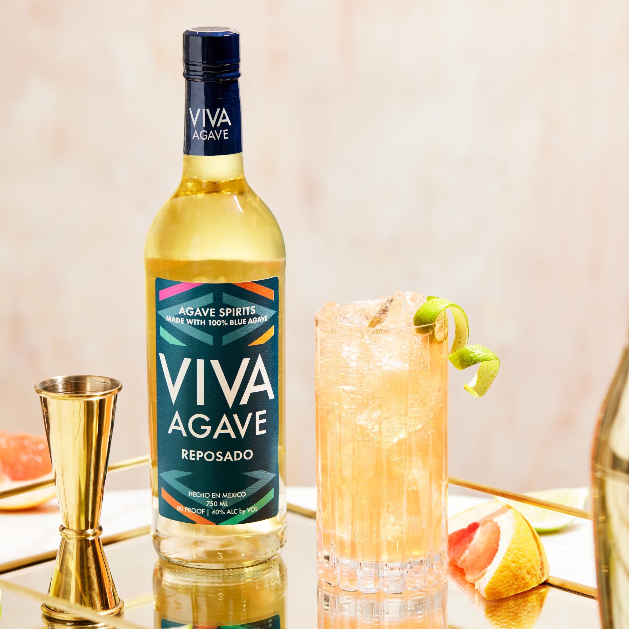 Viva Agave Reposado oak-rested agave spirit bottle with a Paloma cocktail